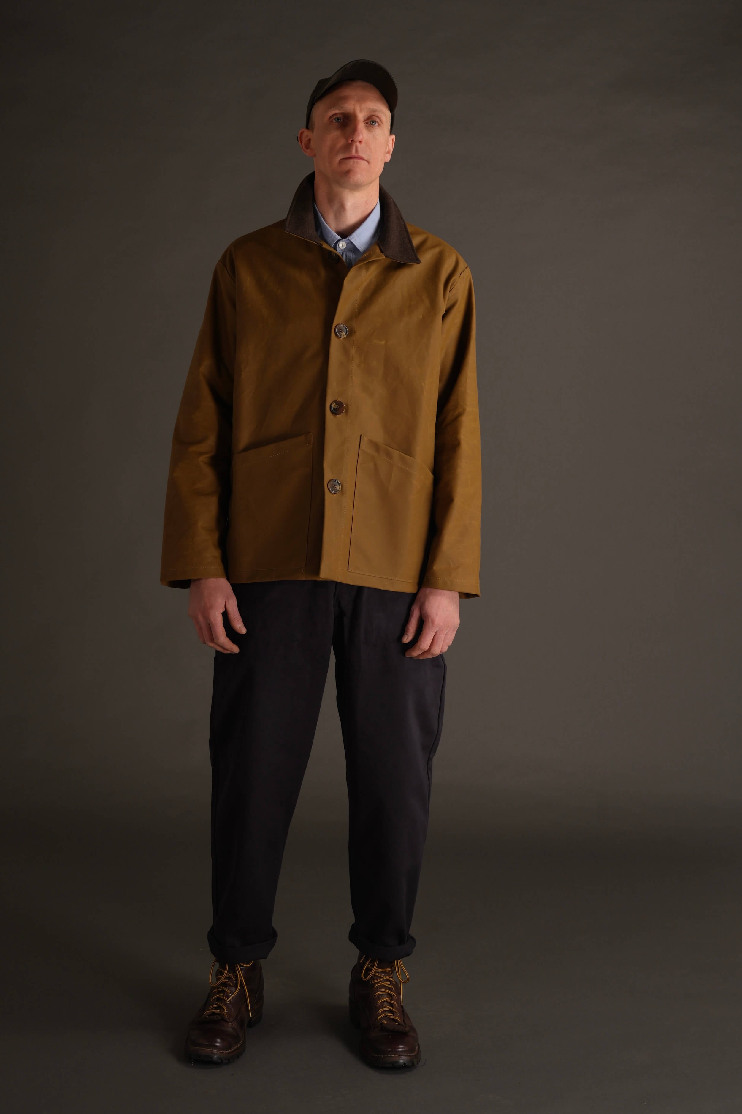 Tommy is 6'4" and wears a Large jacket
