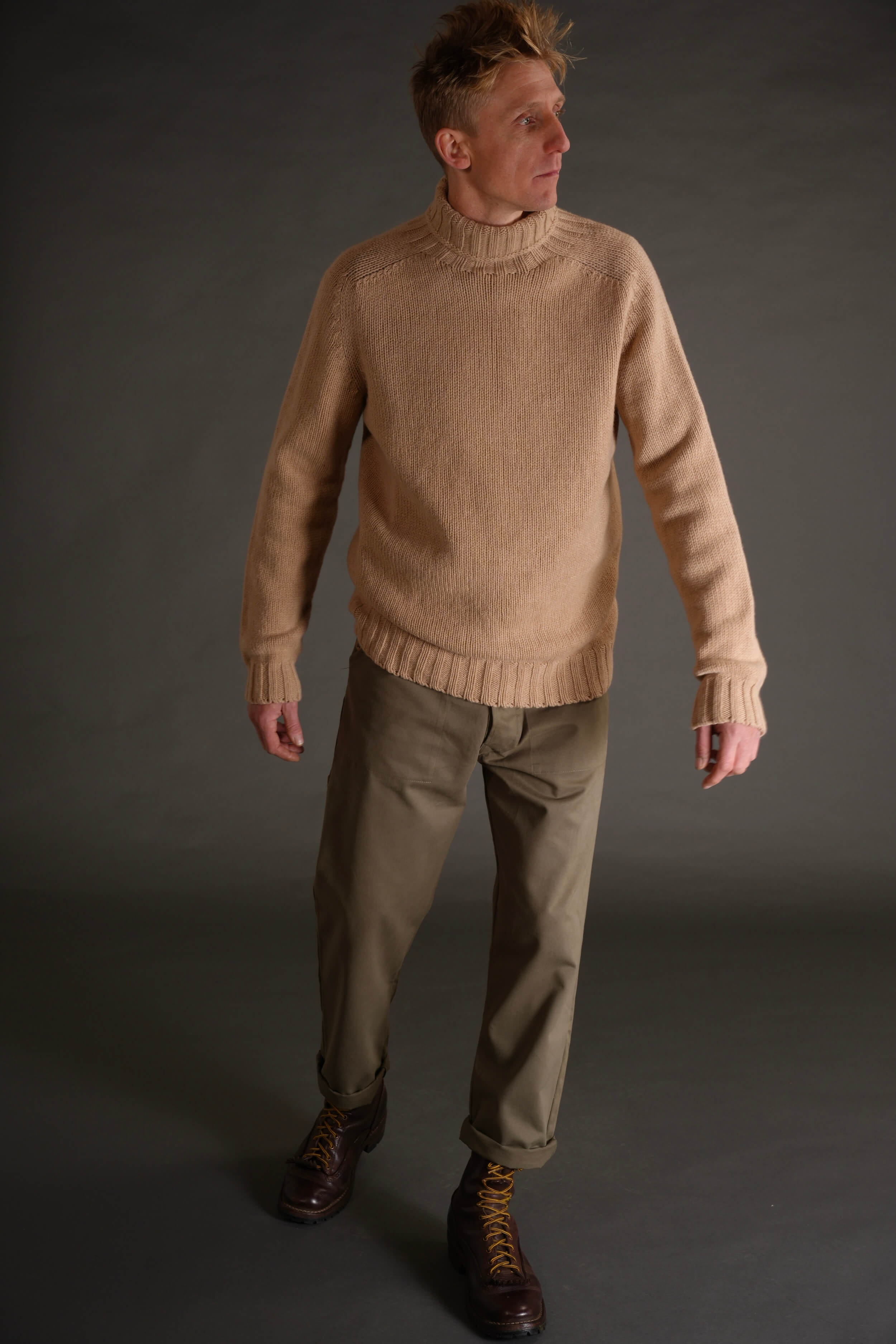 Tommy is 6'4" and wears an XL jumper