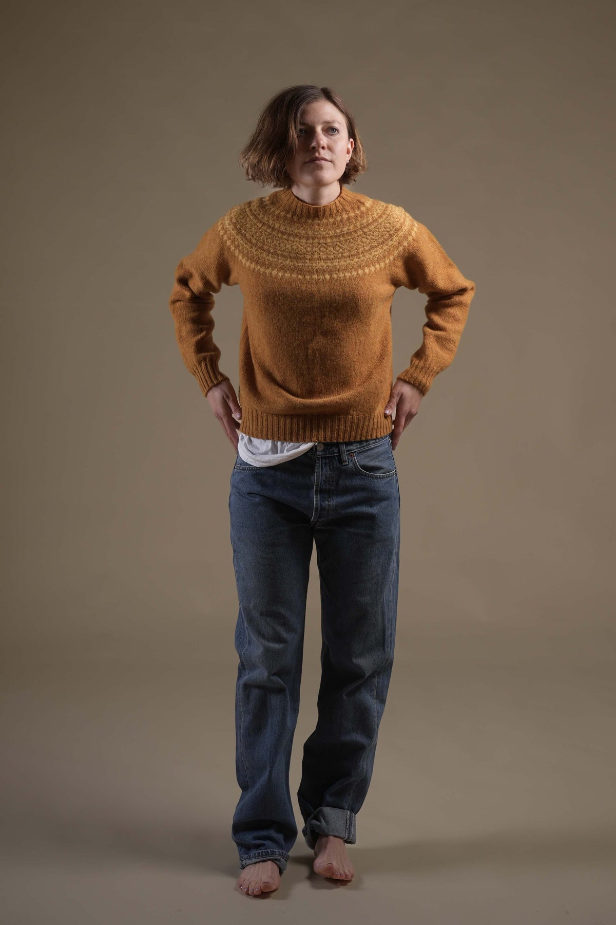Minna is 5'8", size 10 and wears a Small jumper