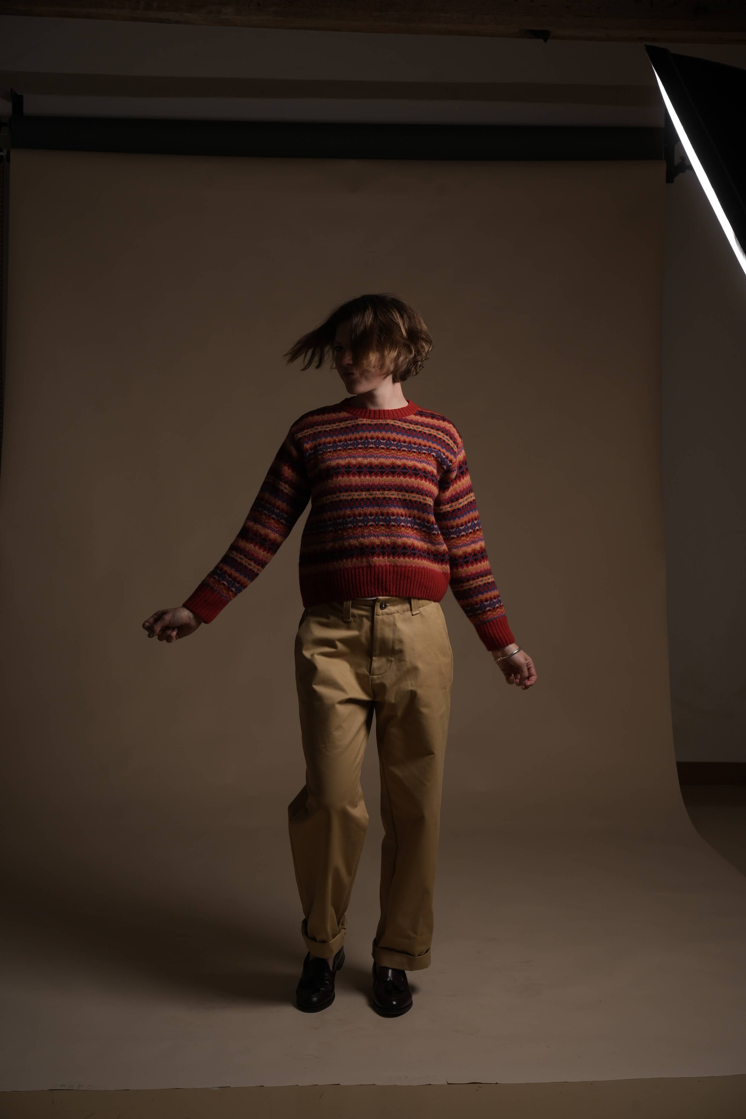 Minna is 5'8", a size 1o and wears a Small jumper