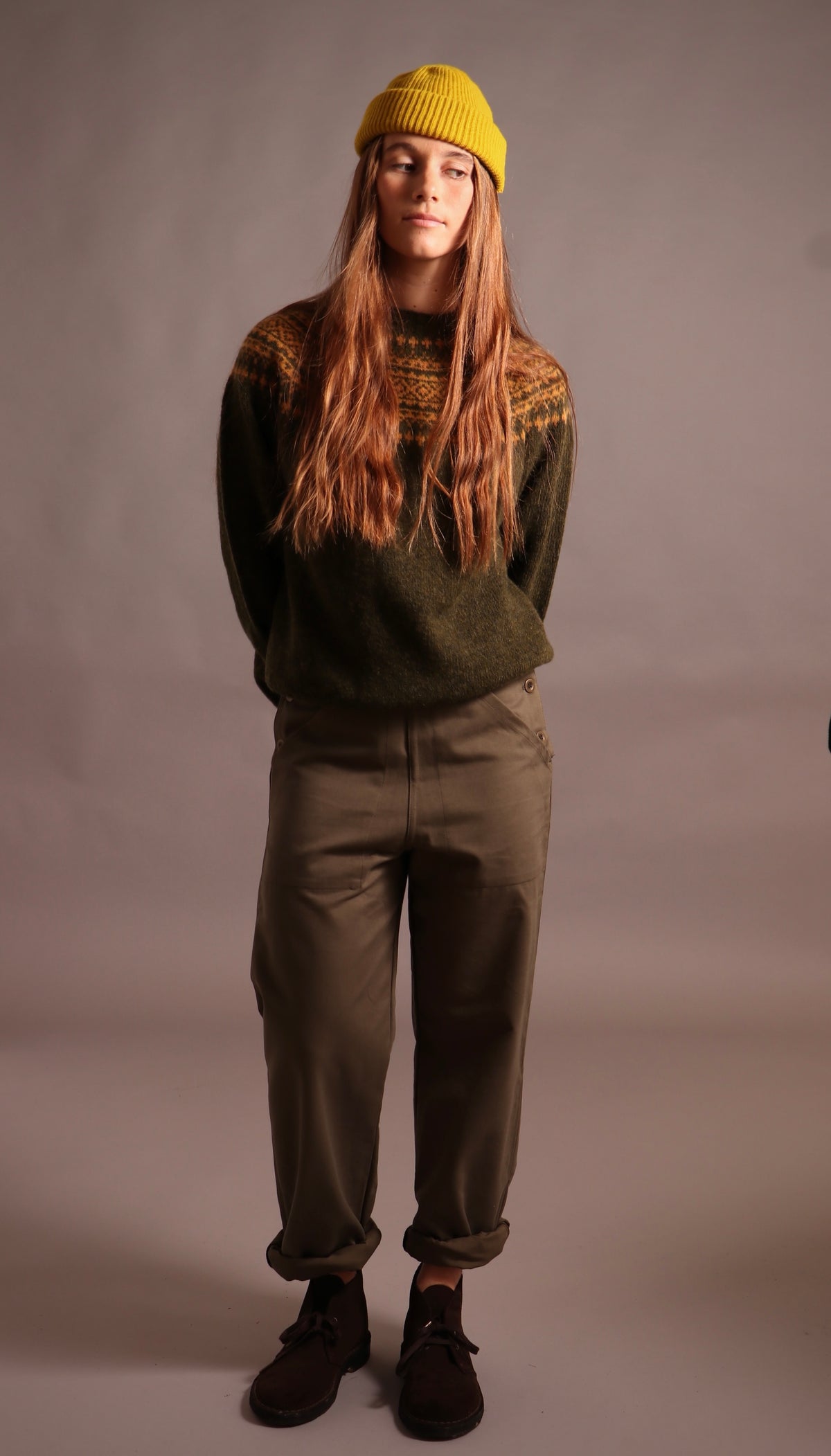 Decca wears Carrier Company Shetland Lambswool Yoke Jumper with Women's Work Trouser and Wool Hat