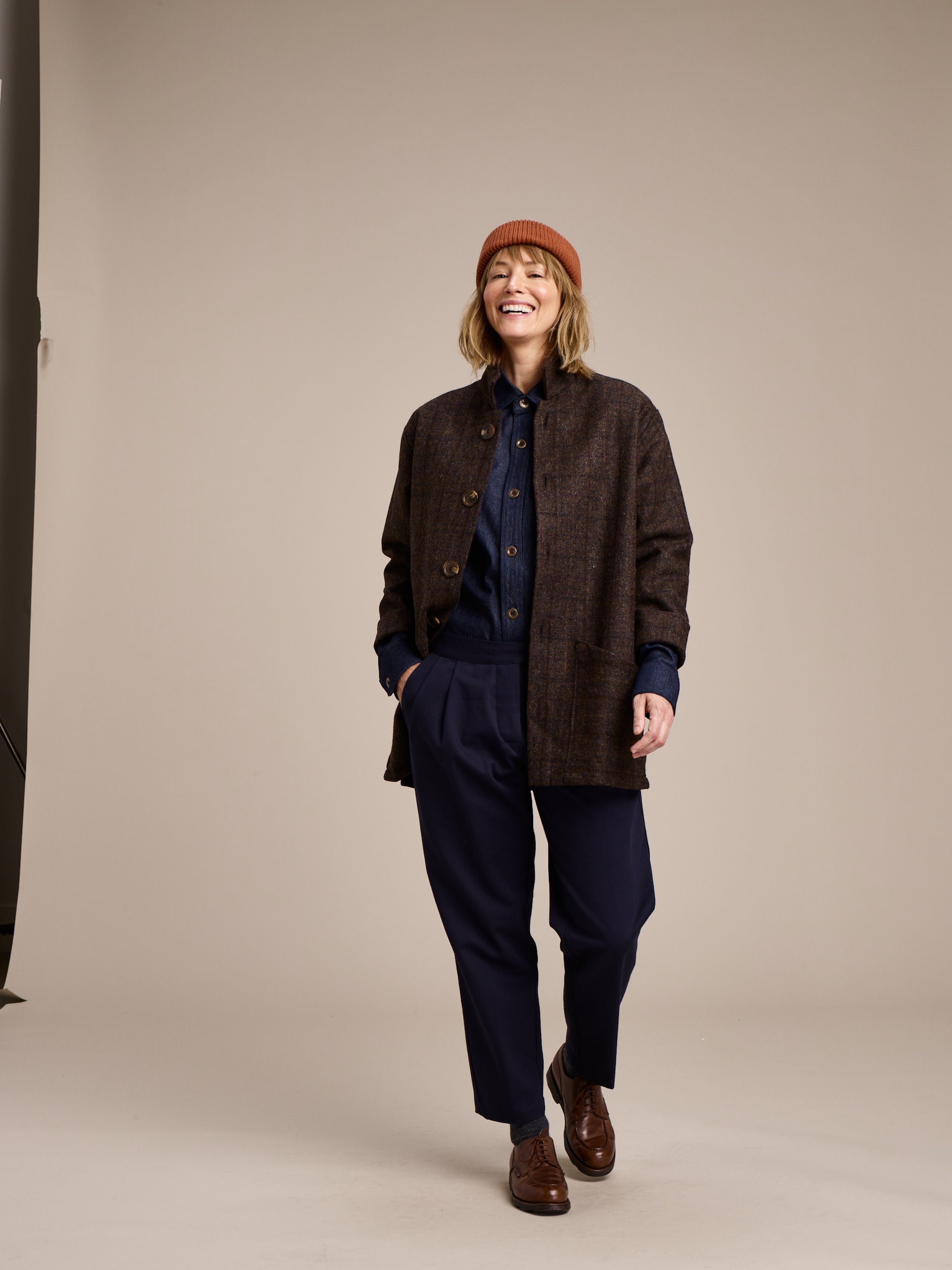Woman wears Carrier Company Cropped Trouser in Navy