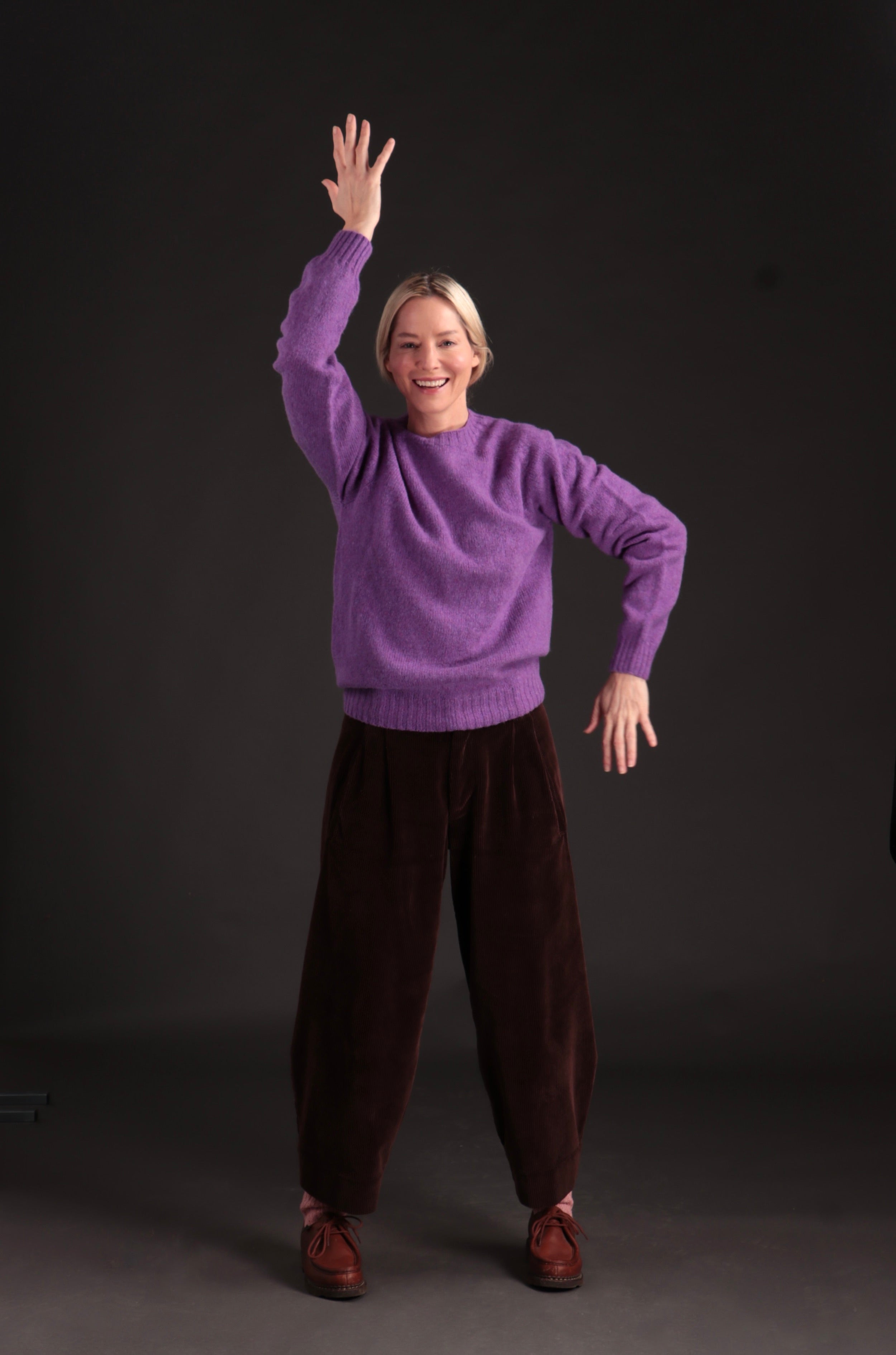 Sienna wears Carrier Company Dutch Trouser with Shetland Lambswool Jumper in Allium
