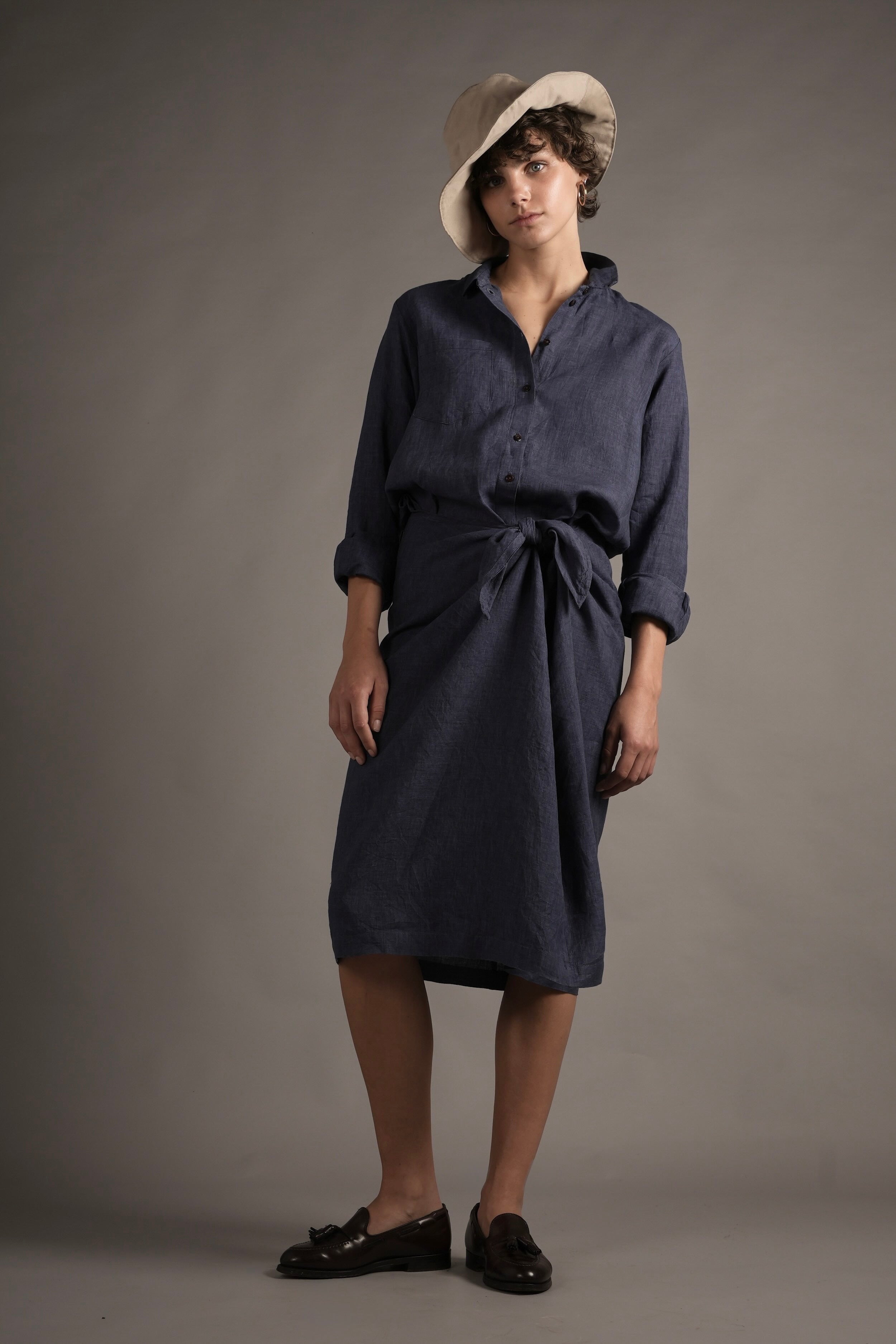 Els wears Carrier Company Shirt Wrap Dress in Navy Linen & Cotton Sun Hat.