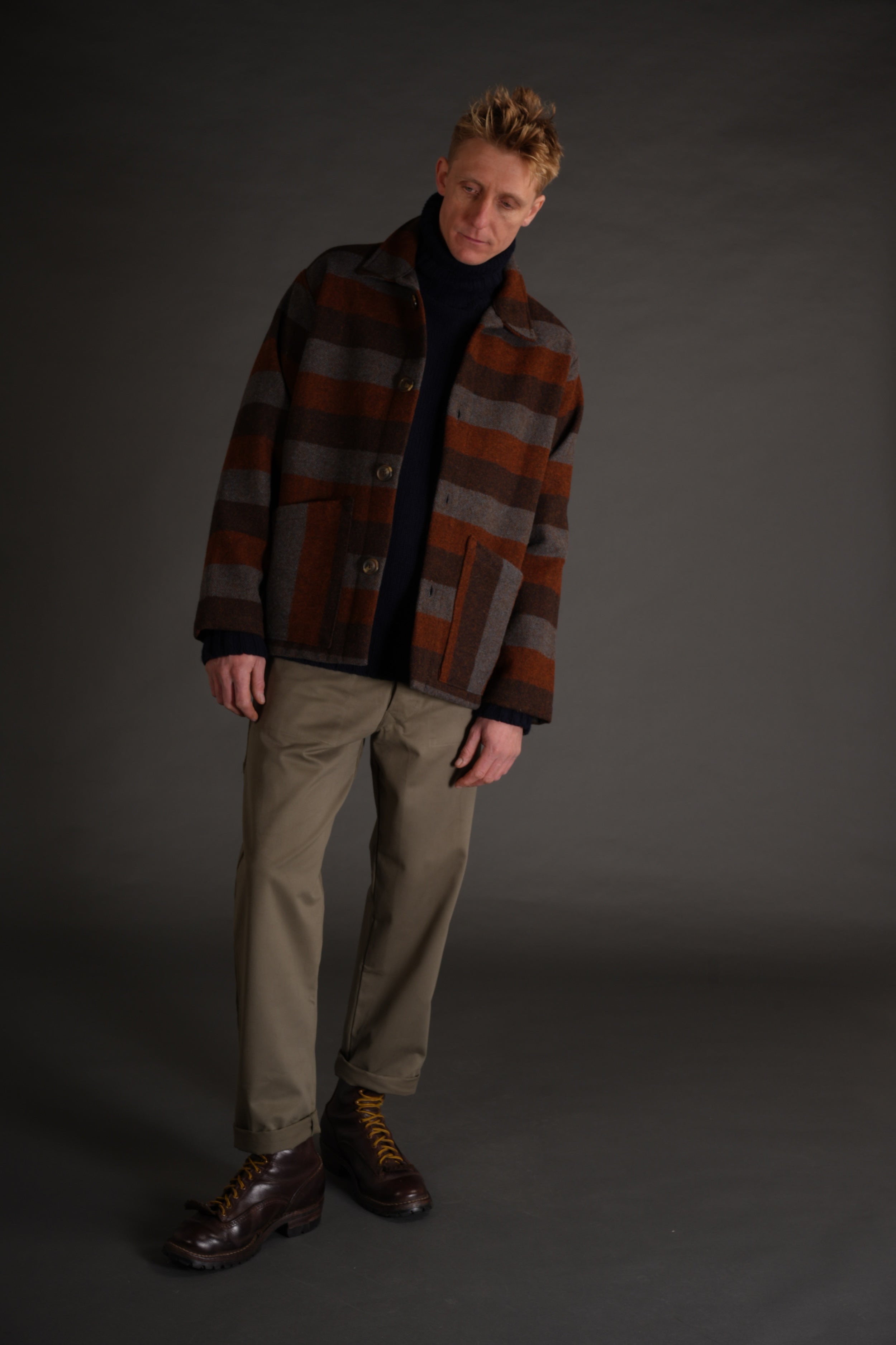 Tomy is 6'4" and wears a size L