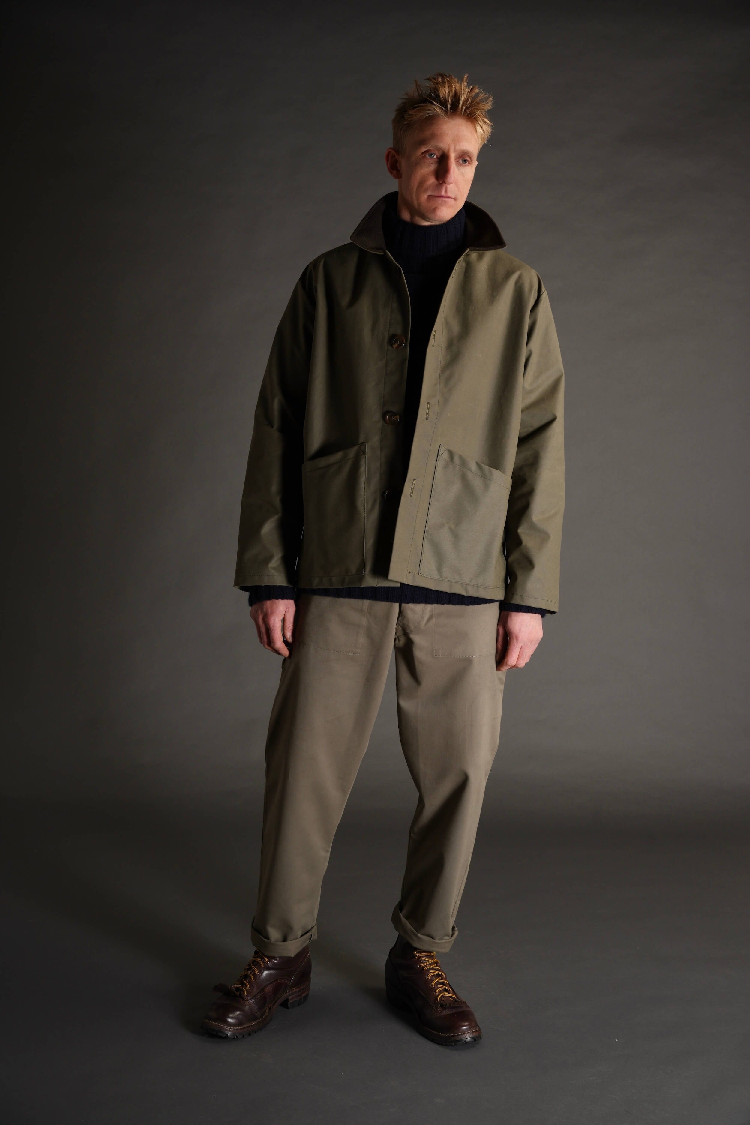 Tommy is 6'4" and wears a Large jacket