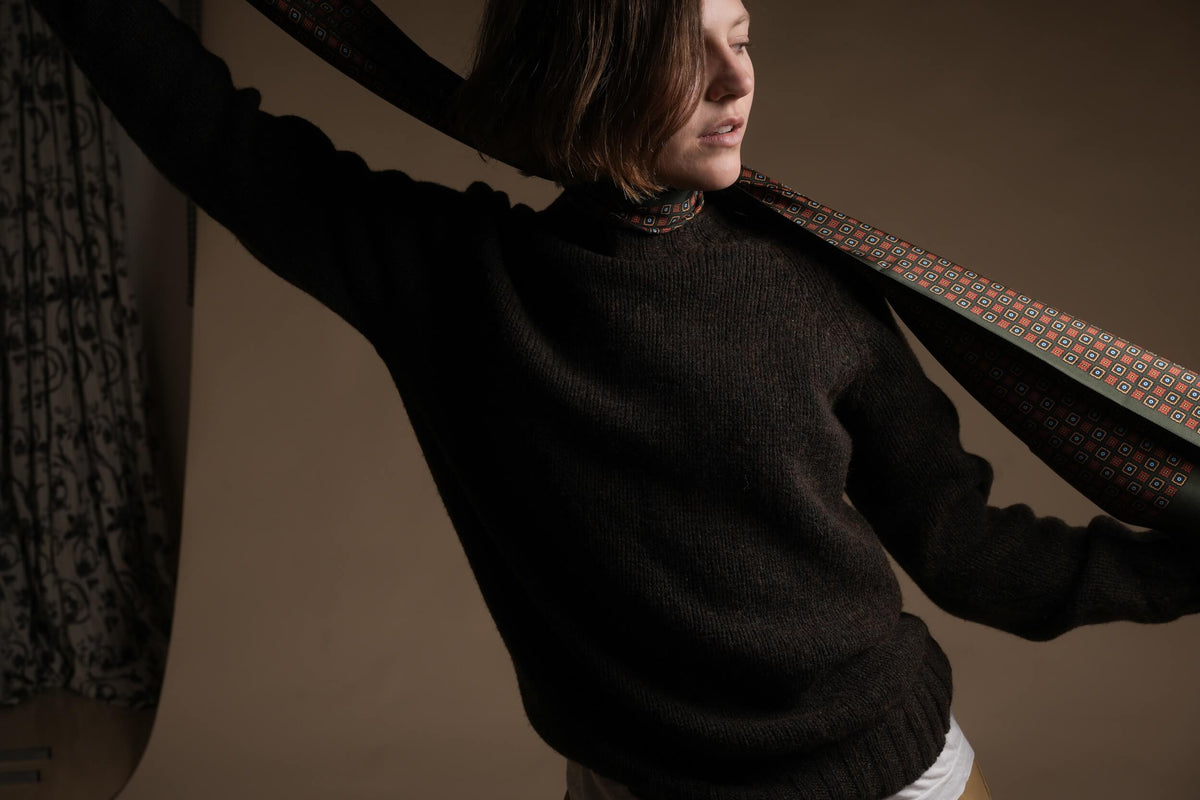 Minna is 5'8", a size 10 and wears a Small jumper