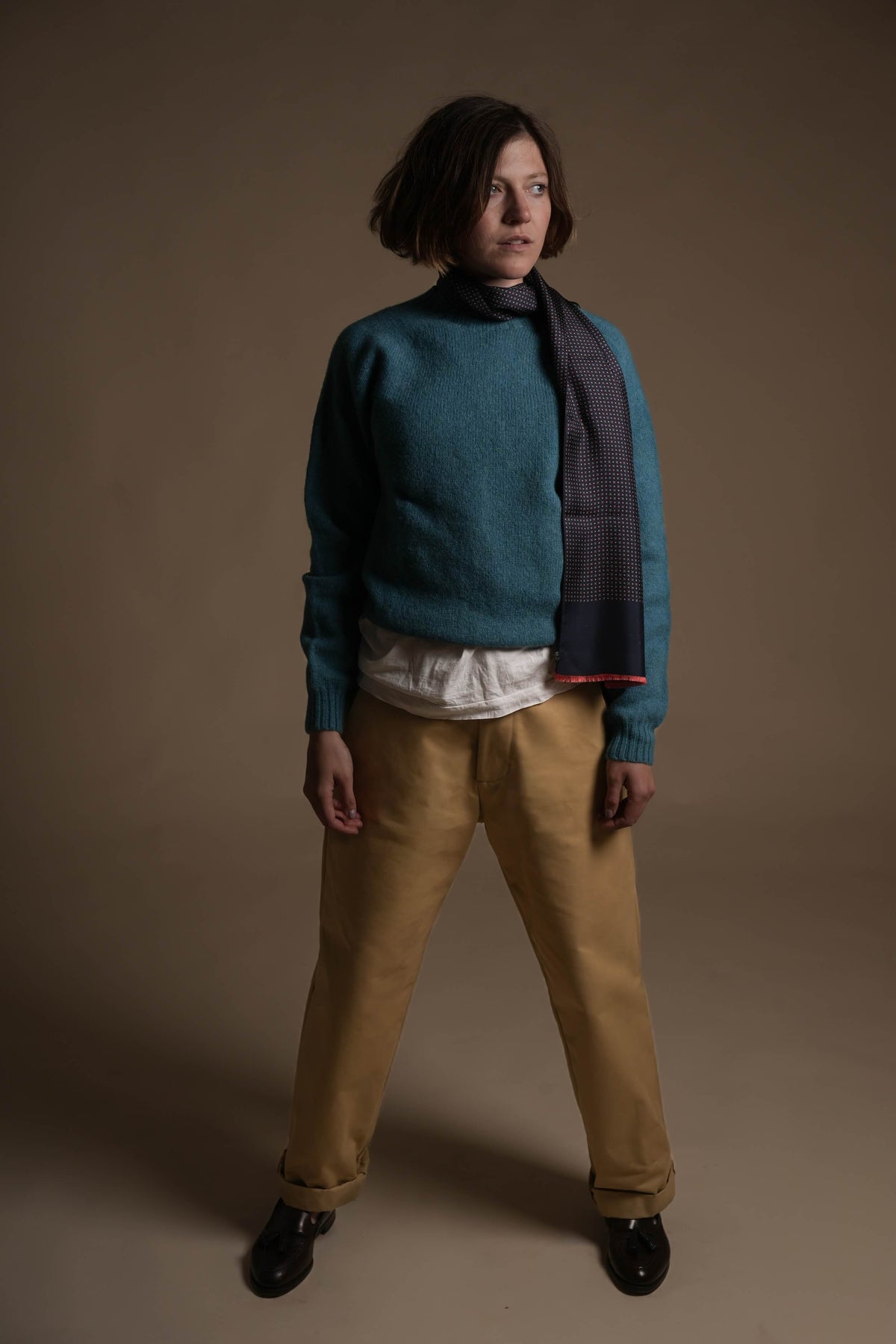 Minna is 5'8", a size 10 and wears a Small jumper