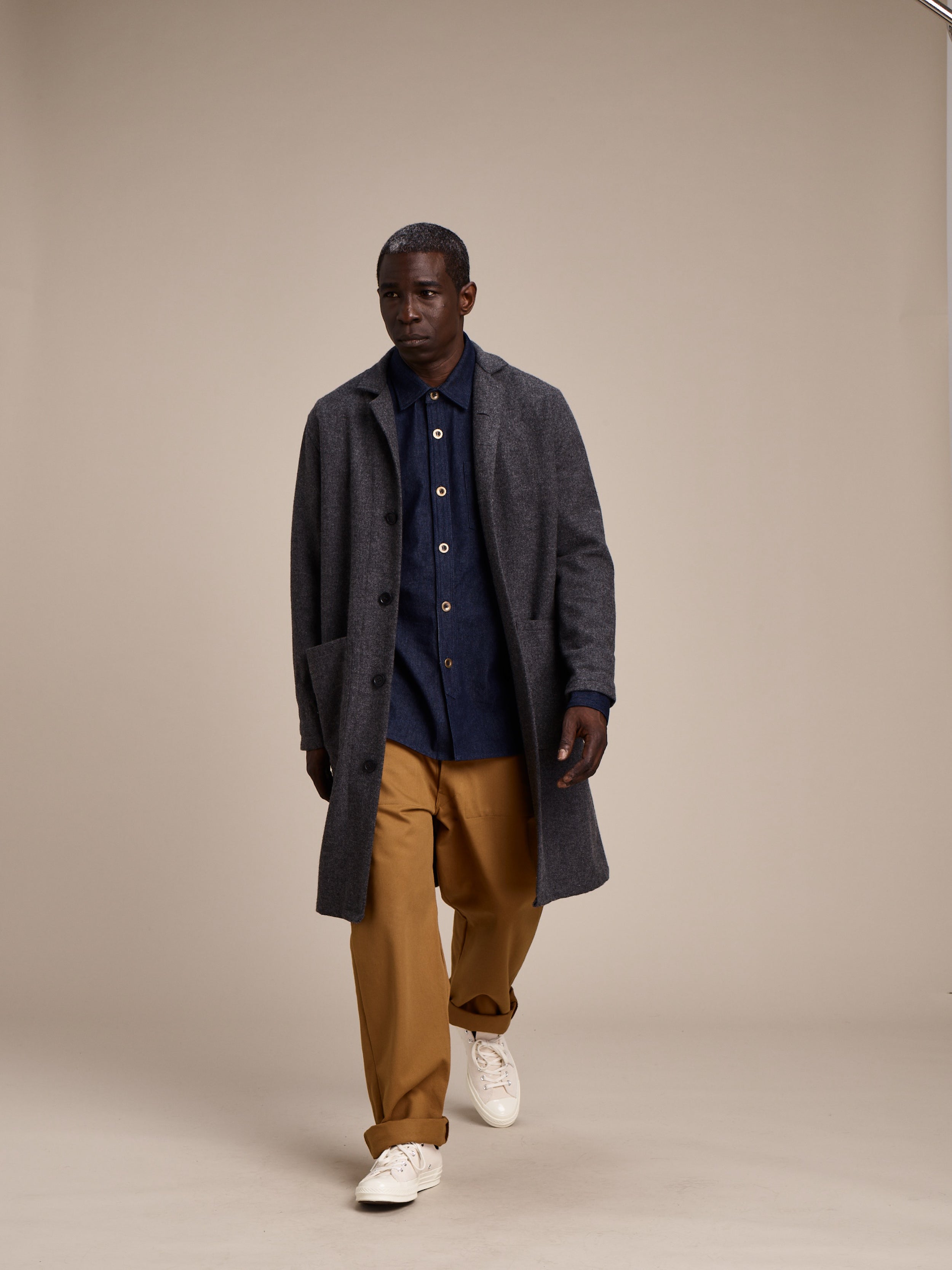 Abdul is 5'10" and wears a Medium coat